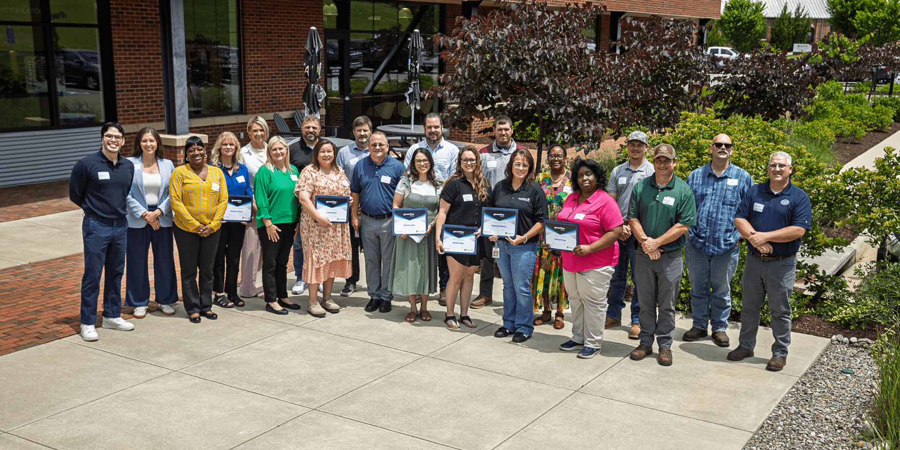 gener8torSkills AI Southern Virginia program completers group photo in front of the SOVA Innovation Hub in June 2026